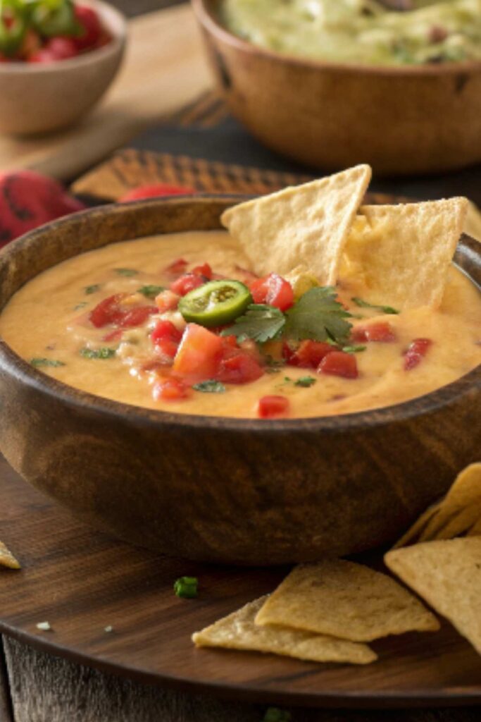 Delicious creamy queso dip with tortilla chips